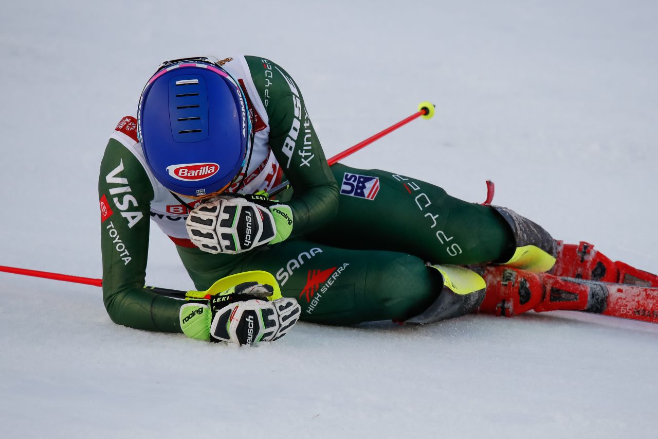 Mikaela Shiffrin collapses to the ground in delight as she wins her fourth consecutive gold in the slalom at the World Ski Championships.