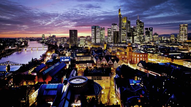 <strong>Frankfurt, Germany:</strong> The sun sets over the bustling Germany city and major financial hub positioned along the River Main.