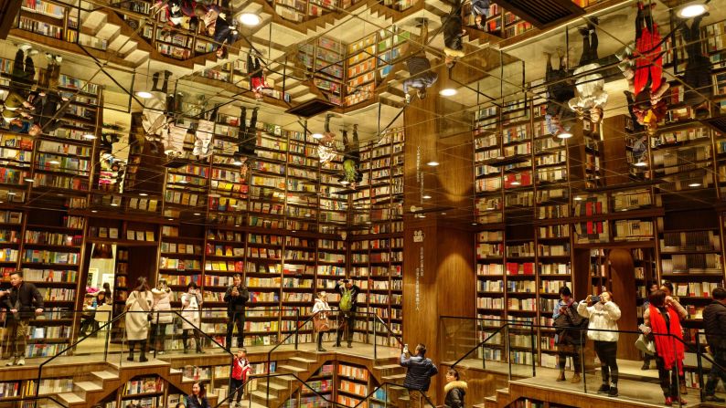 <strong>Chongqing, China:</strong> Adorned with mirrored ceilings and symmetrical staircases, the Zhongshuge bookstore captivates its customers.  