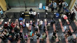 WASHINGTON, DC - SEPTEMBER 01:  Travelers move through one of the Transportation Security Administration lines at Ronald Reagan National Airport's Terminal B and C September 1, 2017 in Washington, DC. More than 16 million Americans will travel on an airplane to celebrate the Labor Day weekend, the unofficial end of summer, says airline industry trade association Airlines or America. The lobbying groups said major airlines are adding 133,000 seats to handle the passenger uptick.  (Photo by Chip Somodevilla/Getty Images)