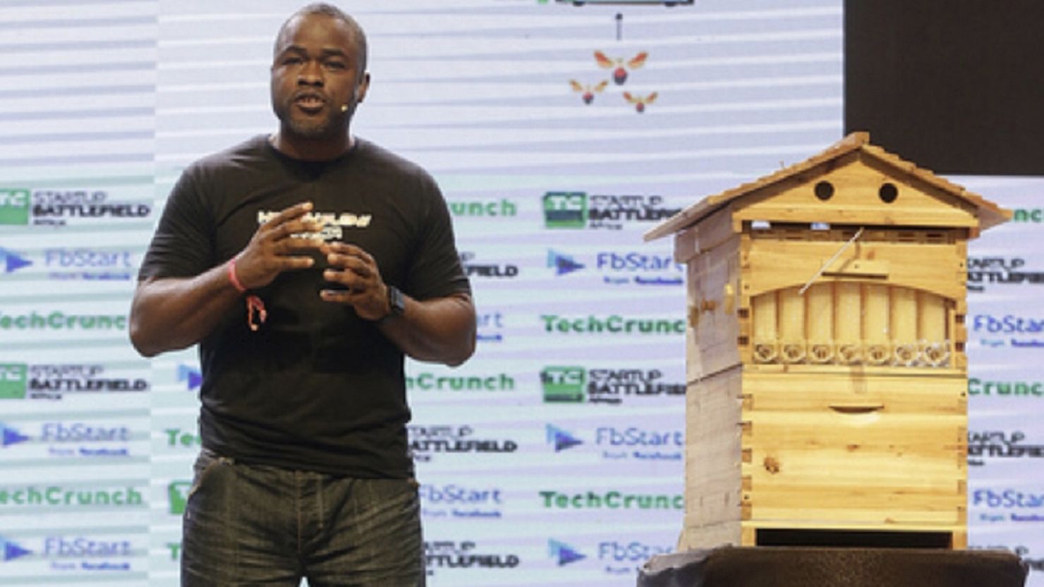 Entrepreneur Amaete Umanah presents the Honeyflow Africa kit at the TechCrunch event Battlefield Africa in December 2018. 