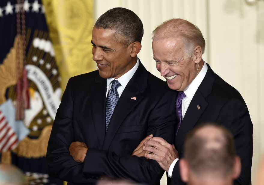 Biden and Obama share a light moment at the White House, where Obama spoke at a reception honoring Hispanic Heritage Month in October 2015.