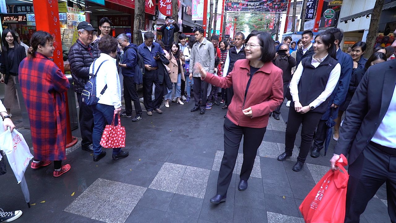 Tsai meets with her constituents on a street in the capital Taipei on February 18.