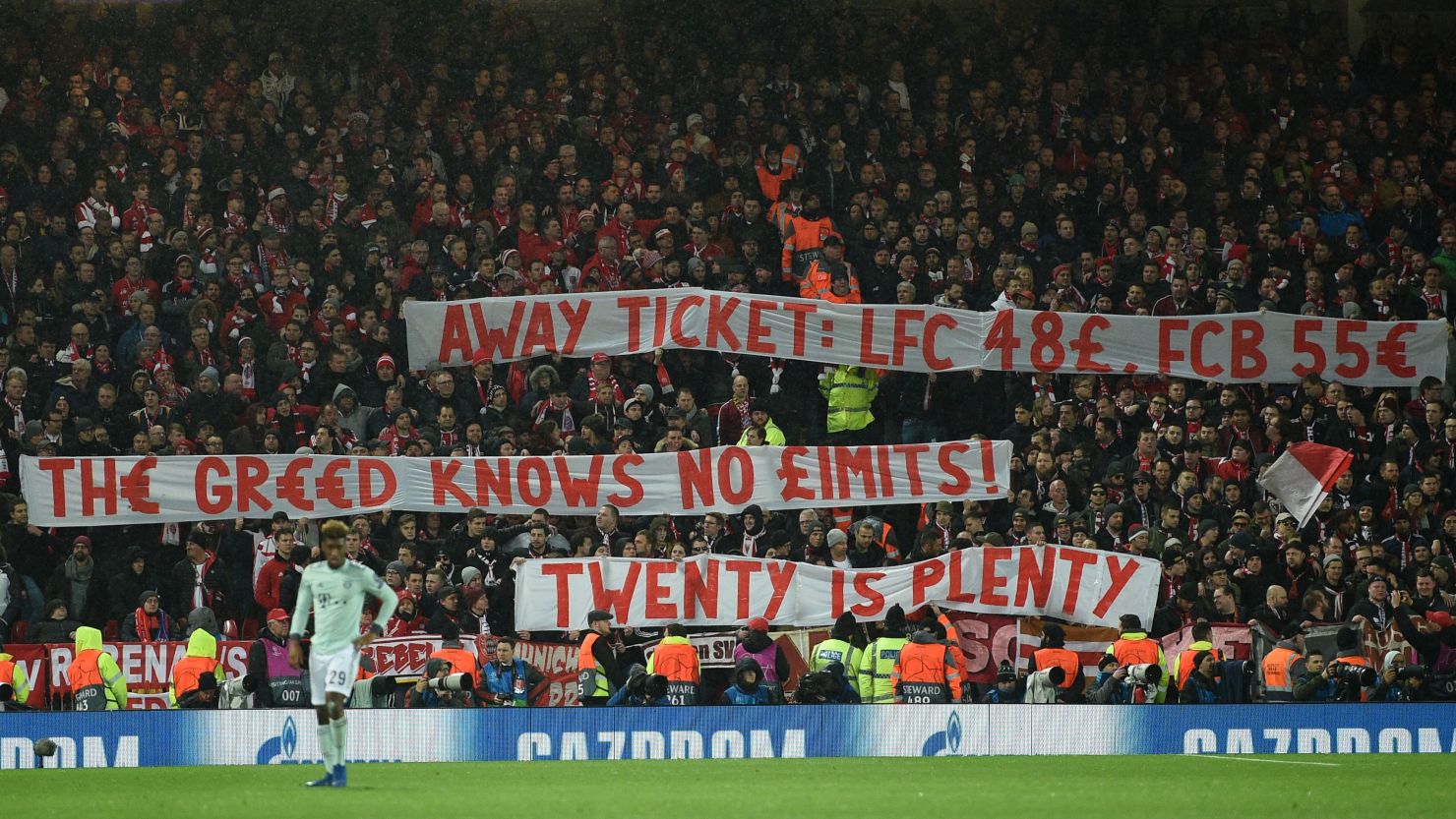 Bayern fans protest against ticket prices during the game at Anfield.