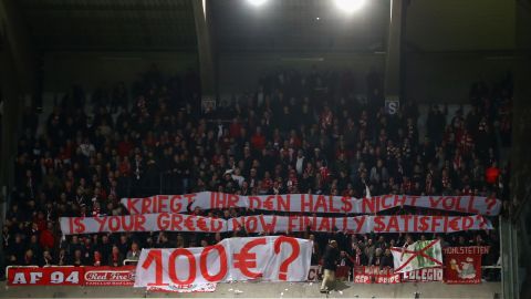 Bayern fans display a banner as they protest against ticket prices during the Champions League match at Anderlecht in 2017.