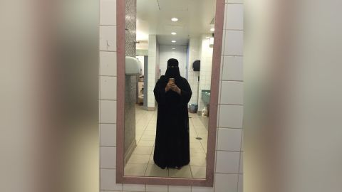 This photo was taken in a restroom in an airport during a trip to Turkey. The sisters wore this type of niqab when they were traveling outside Saudi Arabia. 