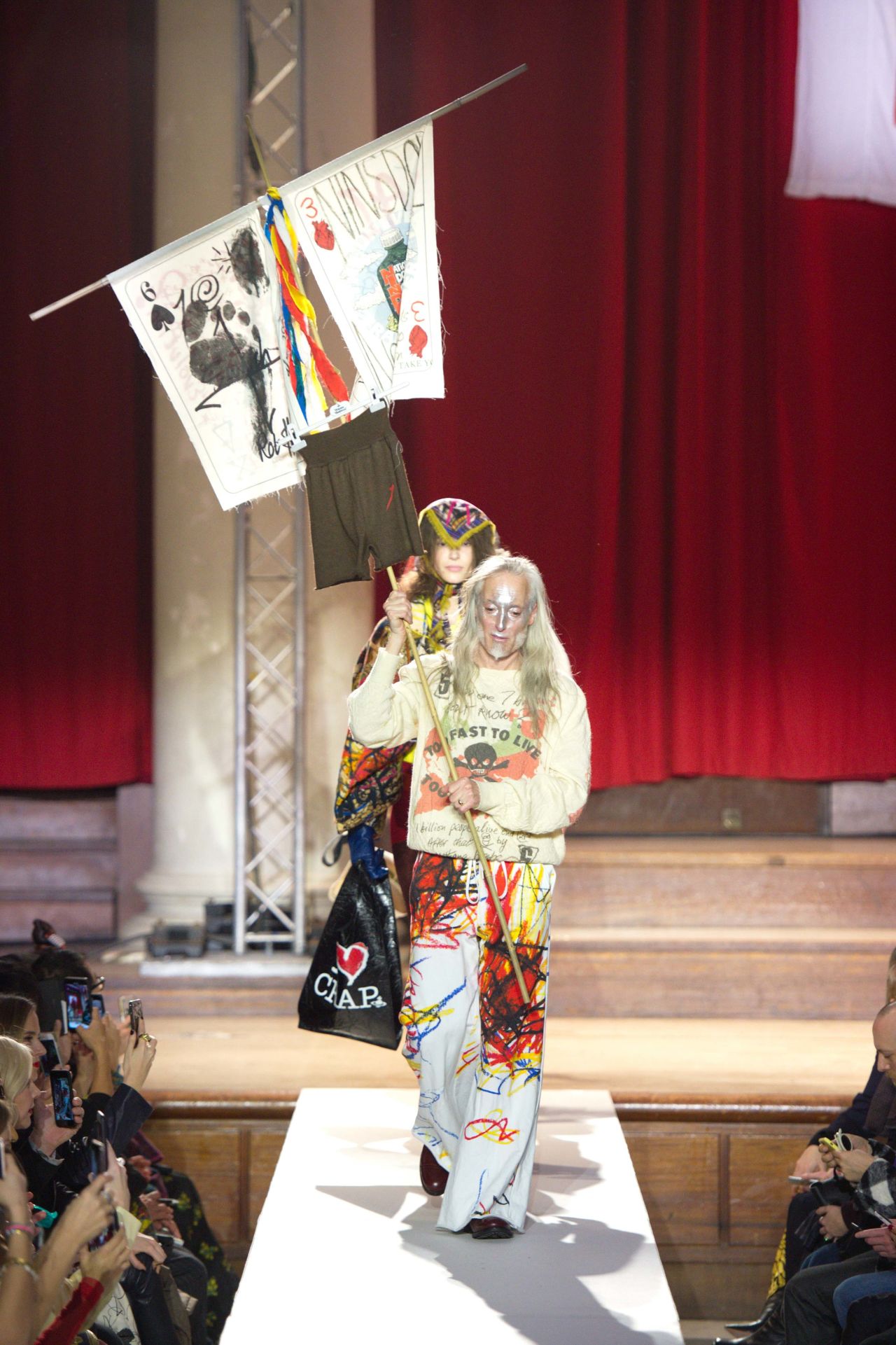 Vivienne Westwood's show featured models wearing T-shirts that berated politicians and carrying bags reading "I Heart Crap."