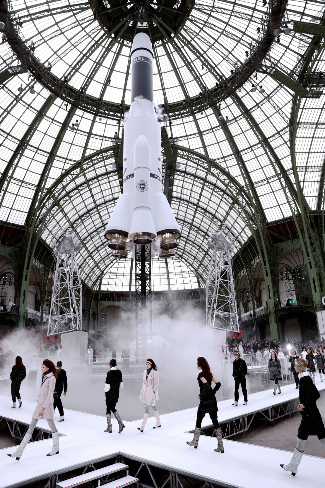 Models present creations by Chanel during the women's Fall-Winter 2017-2018 fashion show at the Grand Palais in Paris in 2017.