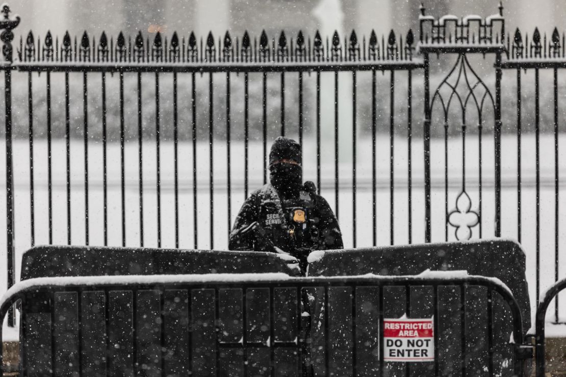 A guard stands in front of the White House on Thursday.