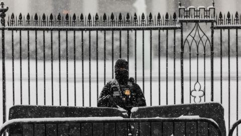 A guard stands in front of the White House on Thursday.