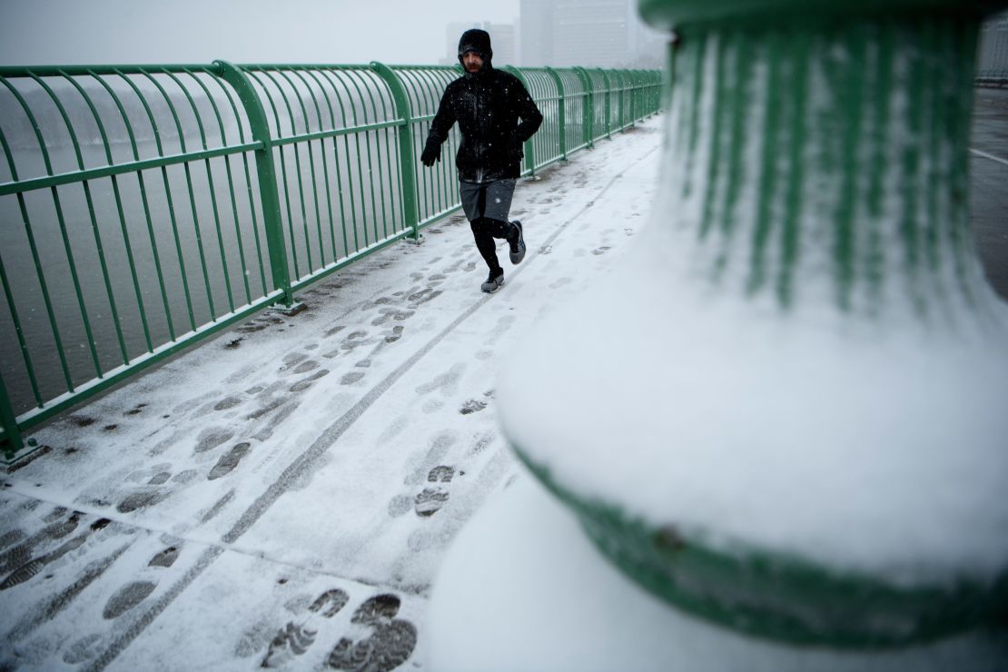 A man runs across the Key Bridge in Washington D.C. on Wednesday.  