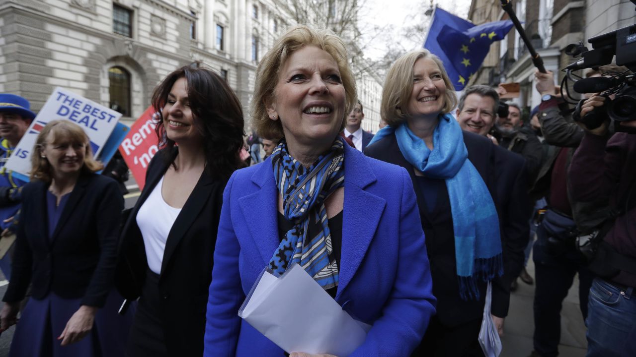 Ex-Conservative MPs Heidi Allen, second left, Anna Soubry, center, and Sarah Wollaston, right, arrive for a press conference in Westminster in London on Wednesday.  