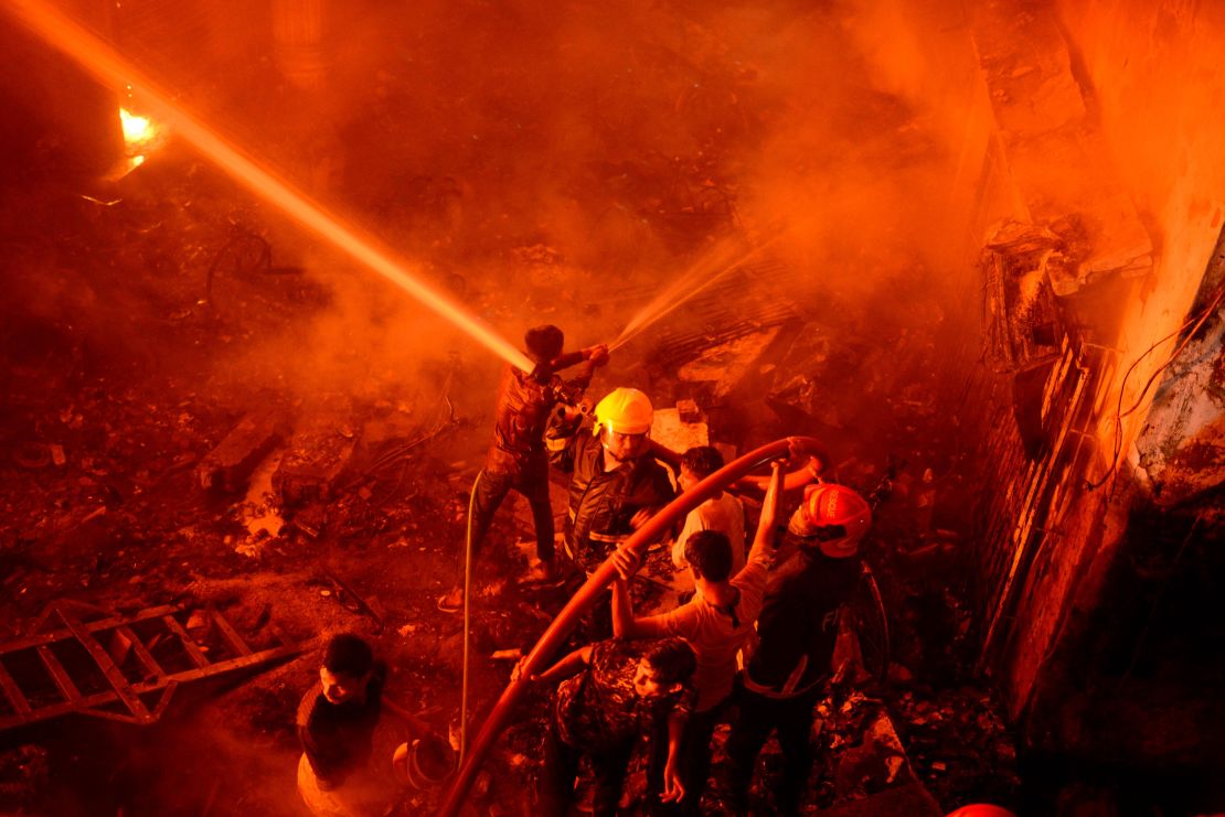 Firefighters try to douse flames in Dhaka, Bangladesh on February 20, 2019.