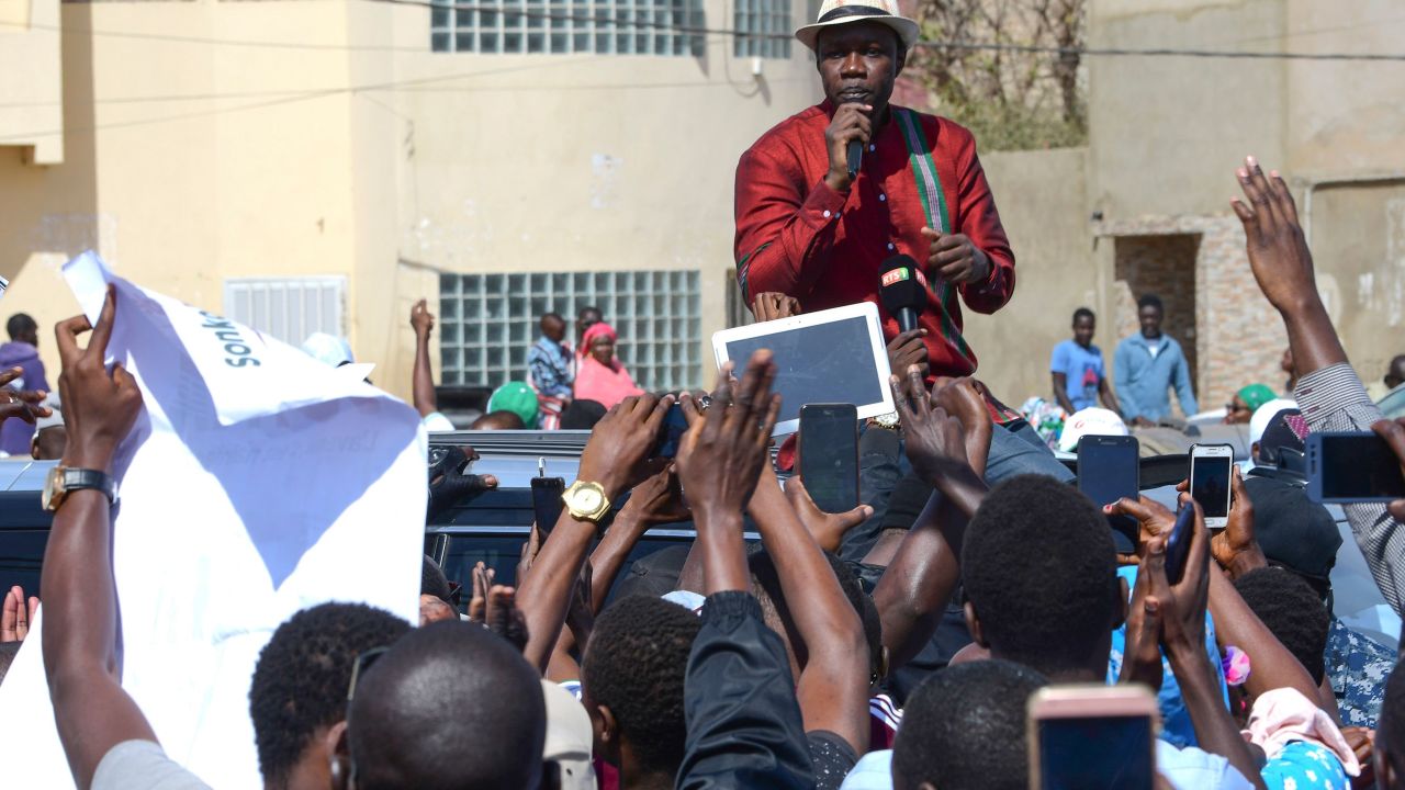 Ousmane Sonko delivering a speech to supporters.
