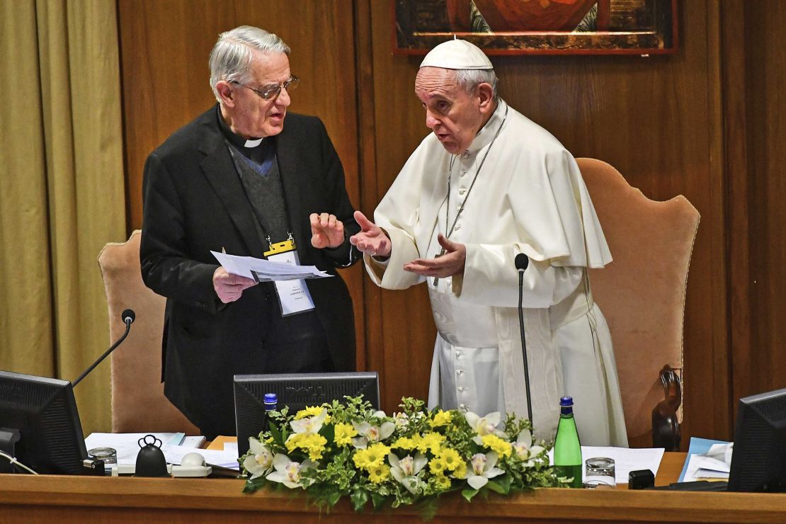 Pope Francis seen speaking with Rev. Federico Lombardi, left, the former Vatican spokesman who is moderating the summit, on Thursday.