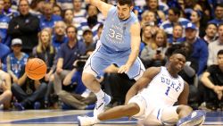 DURHAM, NORTH CAROLINA - FEBRUARY 20: Zion Williamson #1 of the Duke Blue Devils reacts after falling as his shoe breaks against Luke Maye #32 of the North Carolina Tar Heels during their game at Cameron Indoor Stadium on February 20, 2019 in Durham, North Carolina. (Photo by Streeter Lecka/Getty Images)