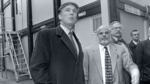 Trump (left) is accompanied in Moscow by the real estate mogul Bennett LeBow (second from left).
