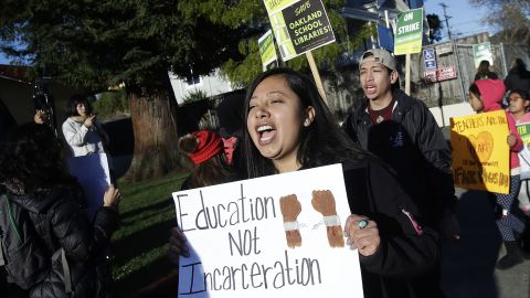 Teacher Roxana De La O Cortez marches in Oakland on February 21. 