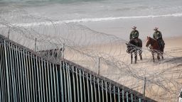 TIJUANA, MEXICO - JANUARY 28: U.S. border patrol agents stand watch across the border where the border wall that separates the U.S. and Mexico meets the Pacific Ocean on January 28, 2019 in Tijuana, Mexico. The U.S. government had been partially shut down as President Donald Trump battled congress for $5.7 billion to build walls along the U.S. border with Mexico. Despite President Trump agreeing to end the shutdown, the debate over border wall funding and other immigration issues continues.  (Photo by Scott Olson/Getty Images)