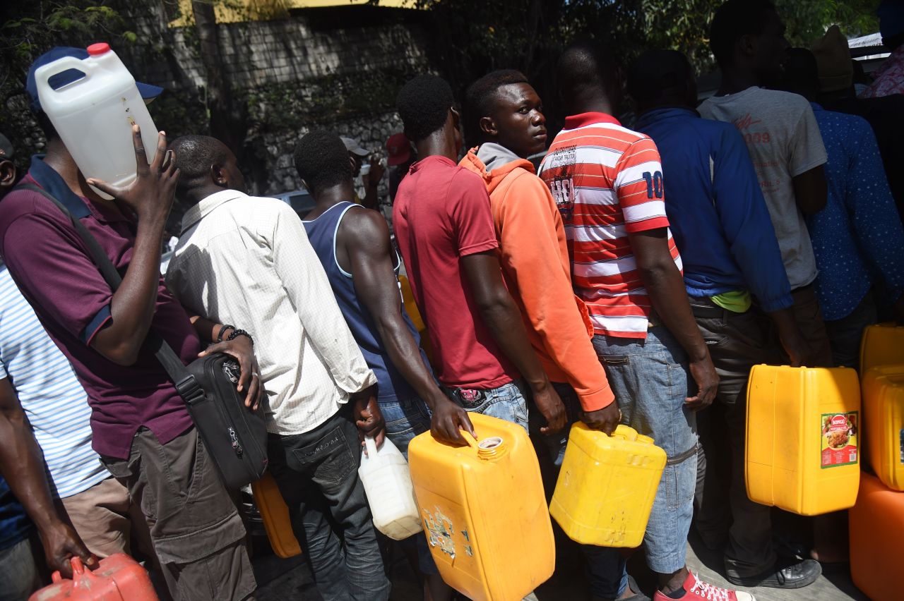 People wait in line for gas in the Port-au-Prince commune of Petion-Ville on Sunday, February 17.