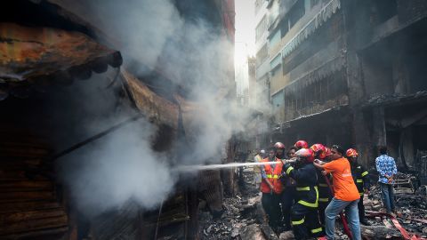 Firefighters try to extinguish a fire in Dhaka on February 21, 2019.