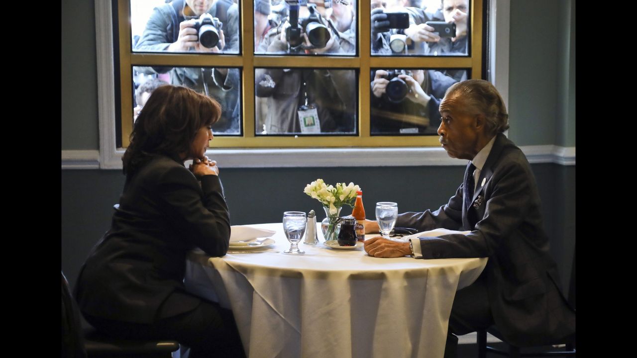 Media members photograph US Sen. Kamala Harris, a Democratic presidential candidate, and the Rev. Al Sharpton as they have lunch at Sylvia's Restaurant in New York on Thursday, February 21. <a href="https://www.cnn.com/interactive/2019/02/politics/2020-presidential-candidates-cnnphotos/" target="_blank">See all the Democrats who are running for president</a>