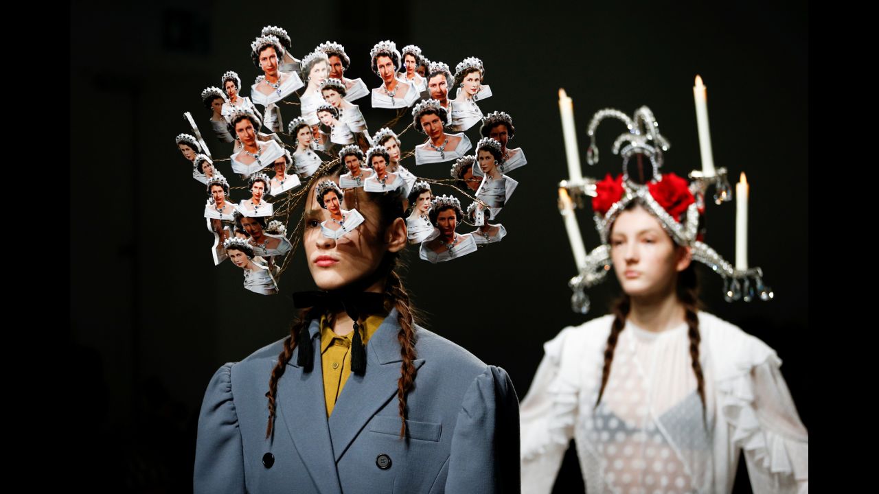 A model presents a creation adorned with images of Britain's Queen Elizabeth II during a Pushbutton catwalk show in London on Tuesday, February 19.