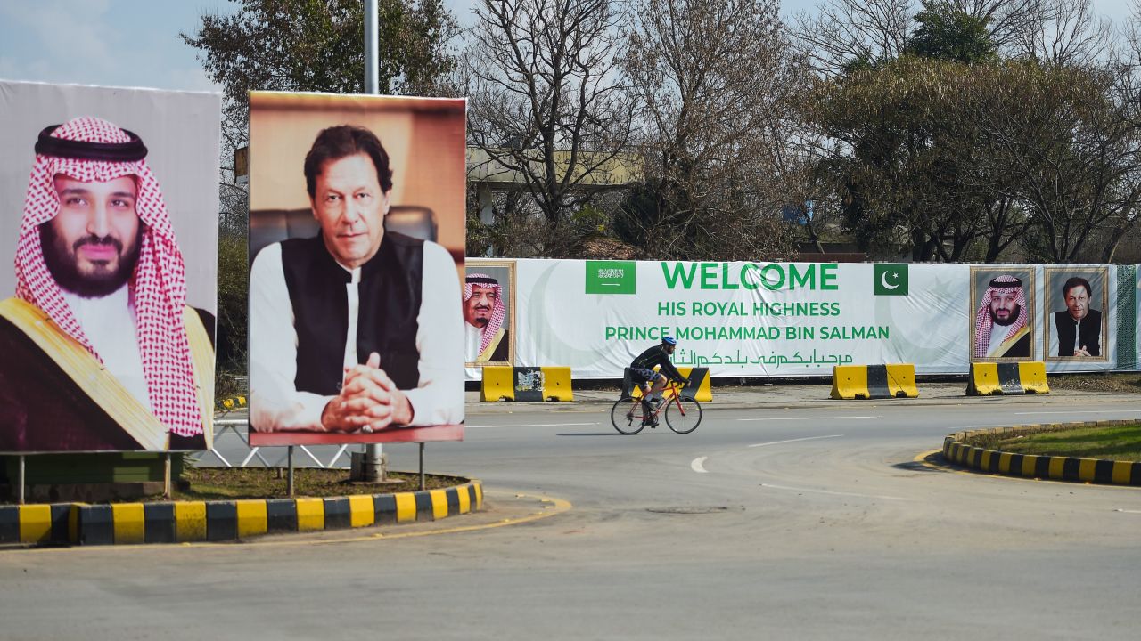 Billboards show portraits of Saudi Arabian Crown Prince Mohammed bin Salman and Pakistan's Prime Minister Imran Khan ahead of his arrival in Islamabad on February 15, 2019.