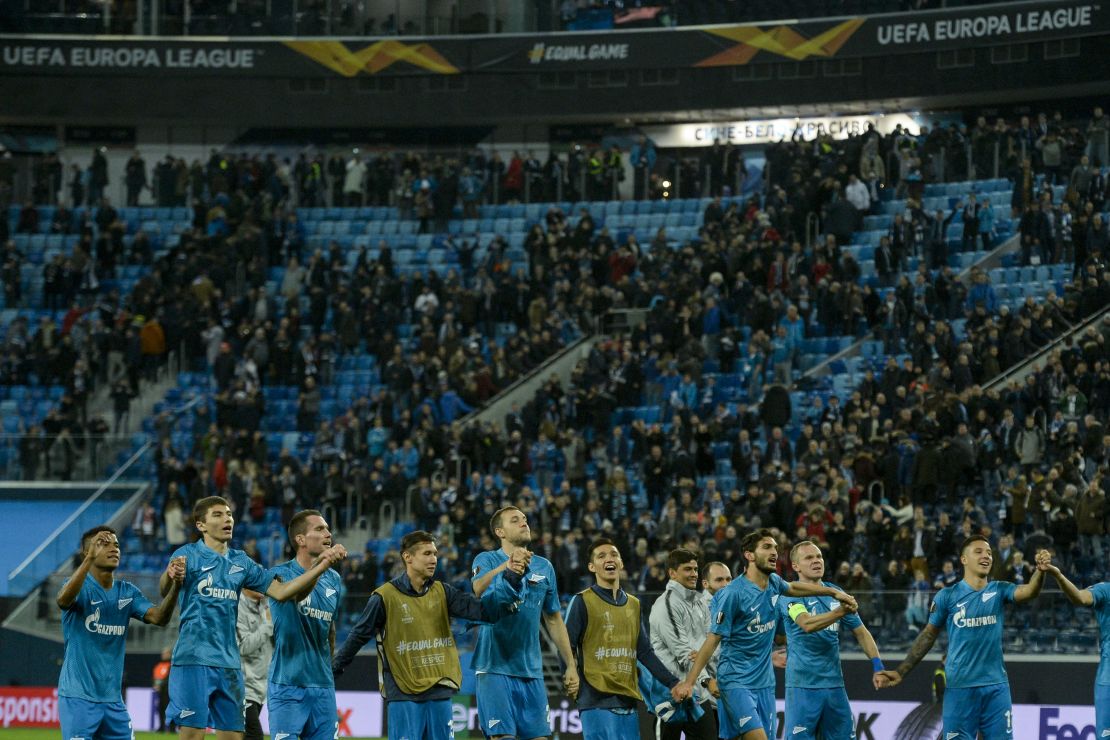 Zenit St. Petersburg's players celebrate after round-of-32 win. 