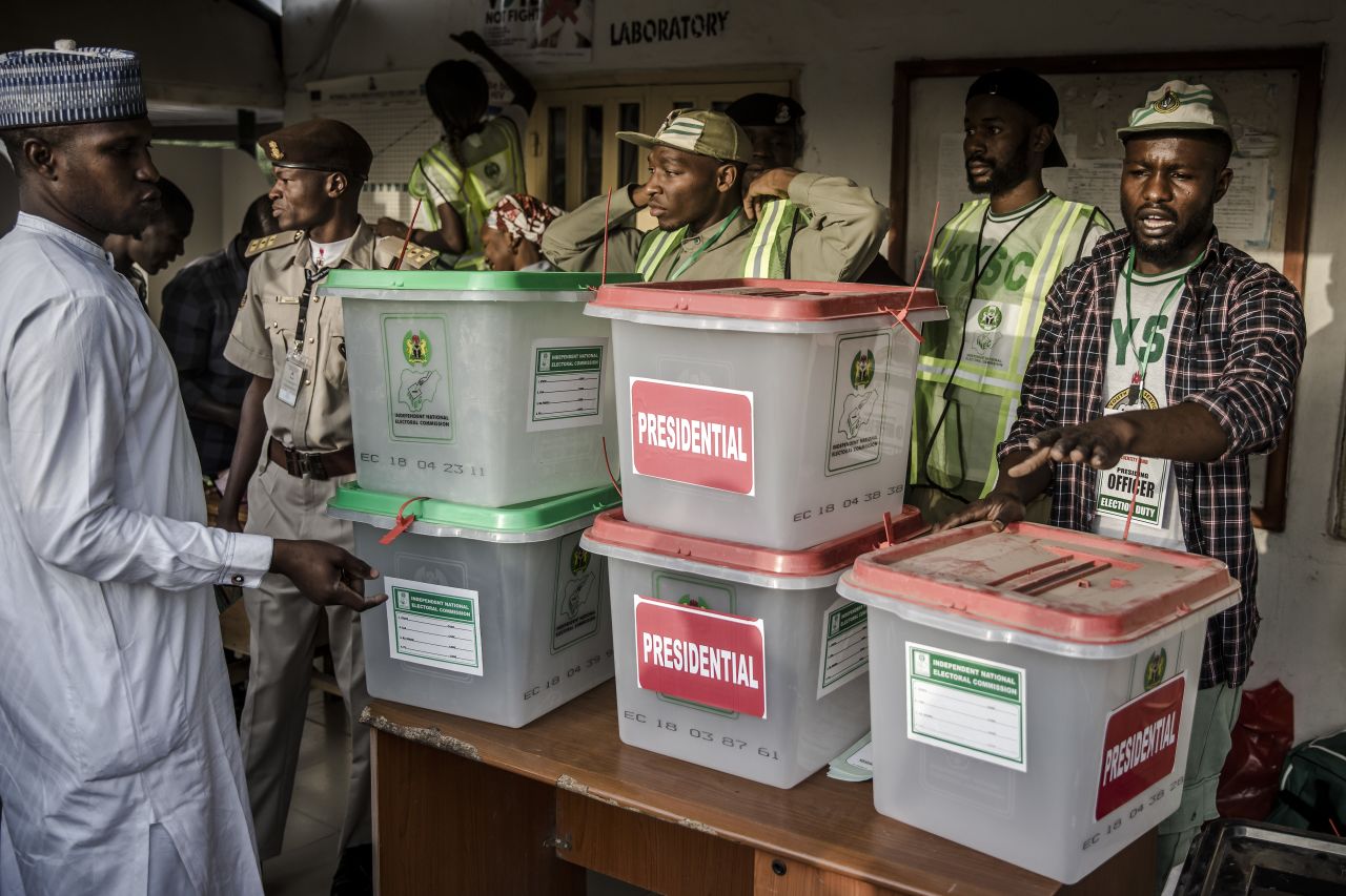 Electoral commission officers prepare ballot boxes before the Shagari Health Unit polling station opens in Yola.