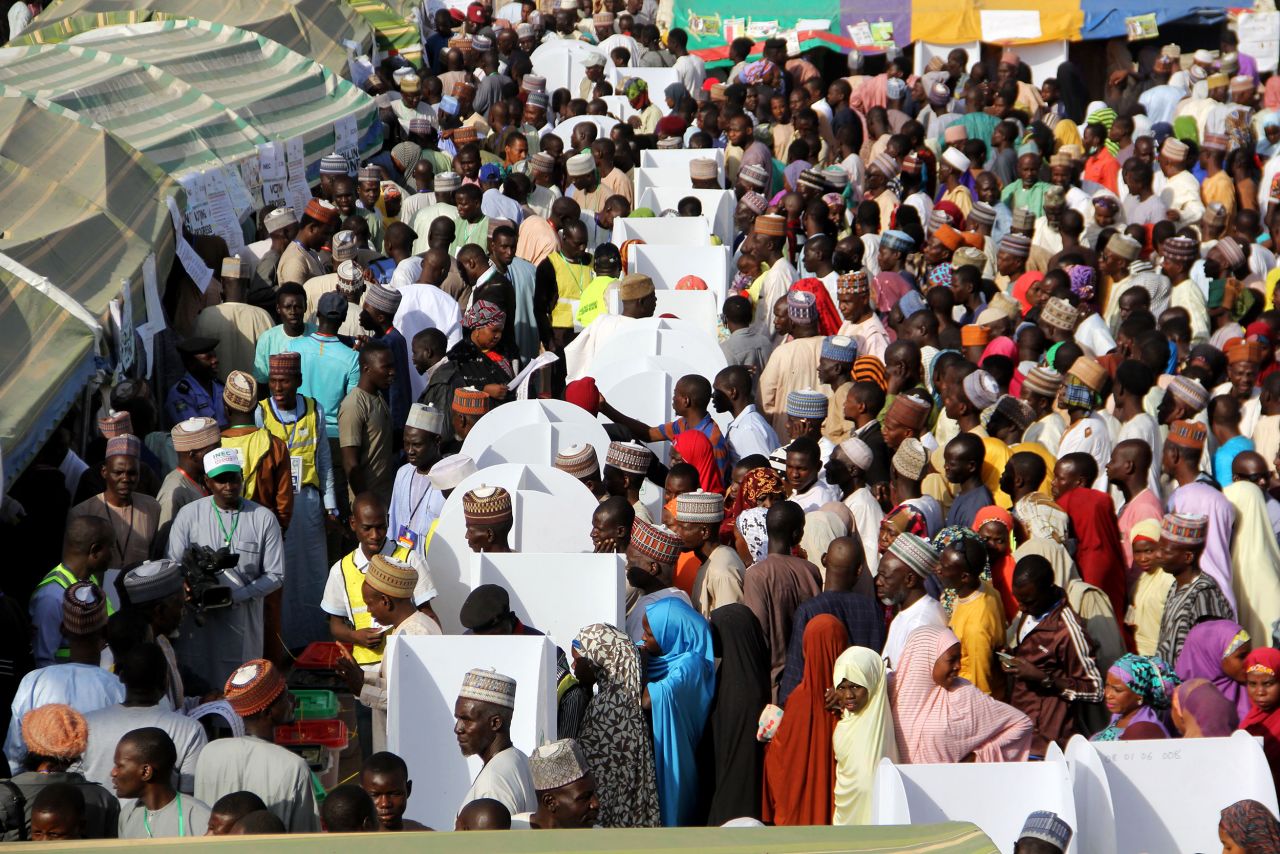 Nigerians wait to vote in Maiduguri.