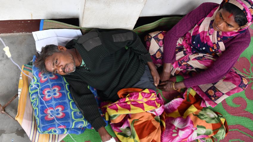 An Indian patient who drank toxic bootleg liquor is treated at Kushal Konwar Civil Hospital in Golaghat district in the northeastern Indian state of Assam on February 23, 2019. - Sixty-nine workers have died and at least 200 others have been hospitalised in northeastern India after drinking toxic liquor, officials said February 23, in the latest case of alcohol poisoning in the country. (Photo by Biju BORO / AFP)        (Photo credit should read BIJU BORO/AFP/Getty Images)