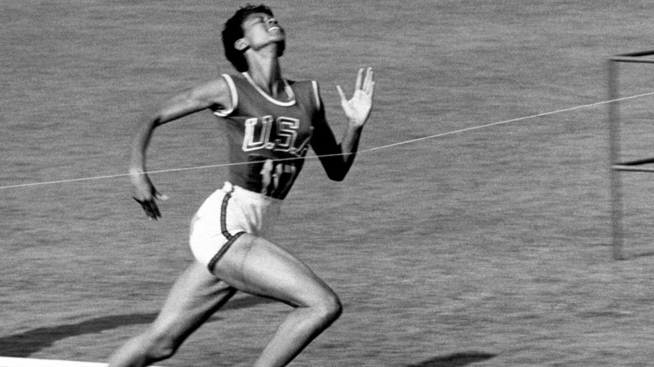 Track star Wilma Rudolph, 20, lunges across the finish line at the 1960 Summer Olympics in Rome.