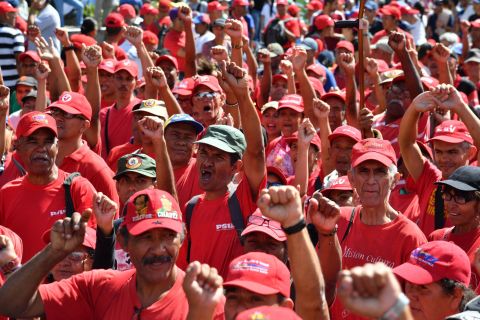 Supporters of President Maduro take part in a march in Caracas on February 23.