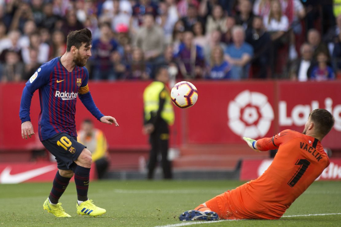 Lionel Messi chips keeper Tomas Vaclik for the winner against Sevilla. 