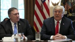 U.S. President Donald Trump, right, speaks while Mike Pompeo, U.S. secretary of state, listens during a meeting in the Cabinet Room of the White House in Washington, D.C., U.S., on Thursday, Aug. 16, 2018. Trump prodded China to offer more at the bargaining table as the two countries prepared for their first major negotiation in more than two months in an effort to head off an all-out trade war. Photographer: Oliver Contreras/Pool via Bloomberg
