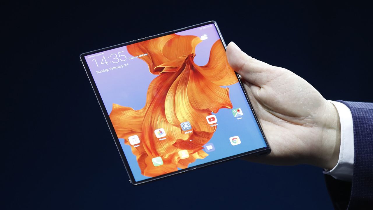 Richard Yu, chief executive officer of Huawei Technologies Co., presents the Mate X foldable 5G mobile device during a Huawei Technologies Co. launch event ahead of the MWC Barcelona in Barcelona, Spain, on Sunday, Feb. 24, 2019. At the wireless industrys biggest conference, over 100,000 people are set to see the latest innovations in smartphones, artificial intelligence devices and autonomous drones exhibited by more than 2,400 companies. Photographer: Stefan Wermuth/Bloomberg via Getty Images