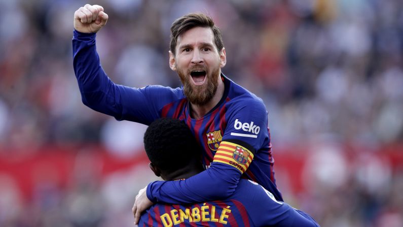 Barcelona star Lionel Messi celebrates a goal with Ousmane Dembele during a Spanish league match against Sevilla on Saturday, February 23. Messi had a hat trick in the 4-2 win. It was <a href="index.php?page=&url=https%3A%2F%2Fwww.cnn.com%2F2019%2F02%2F23%2Ffootball%2Fmessi-barcelona-sevilla-tottenham-football-spt-intl%2Findex.html" target="_blank">the 50th hat trick of his career.</a>