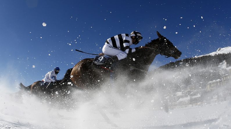 Horses race at the White Turf event in St. Moritz, Switzerland, on Sunday, February 17.