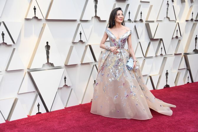The "Crazy Rich Asians" star Michelle Yeoh has worn Elie Saab to numerous red carpets this year. This time, she paired a shimmery, off-shoulder gown with a showstopping bracelet by Chopard and watch by Richard Mille. 