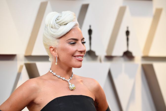 Best actress nominee Lady Gaga has been evoking Hollywood glamour since the start of the 2019 awards season -- from wearing a Judy Garland-esque periwinkle gown to the Golden Globes, to the knockout Tiffany's 128-carat yellow diamond necklace that she paired with a structural black gown by Alexander McQueen at the Oscars. 