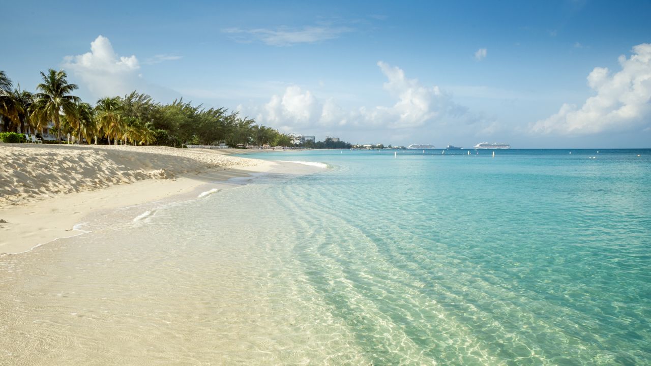 Seven Mile Beach on Grand Cayman island. The Cayman Islands are currently on the "green list."