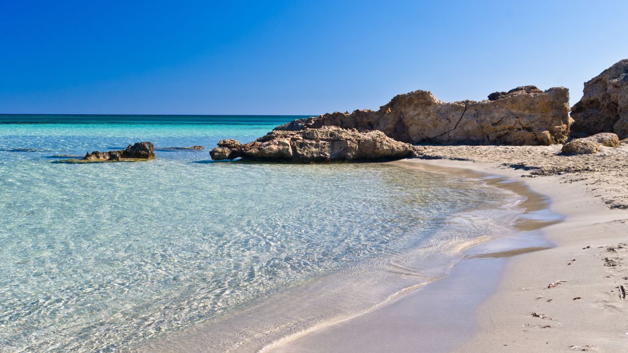 <strong>21. Elafonissi Beach, Crete:</strong> This stunning Greek beach featuring pink-tinted sands and turquoise waters also garnered praise for travelers.