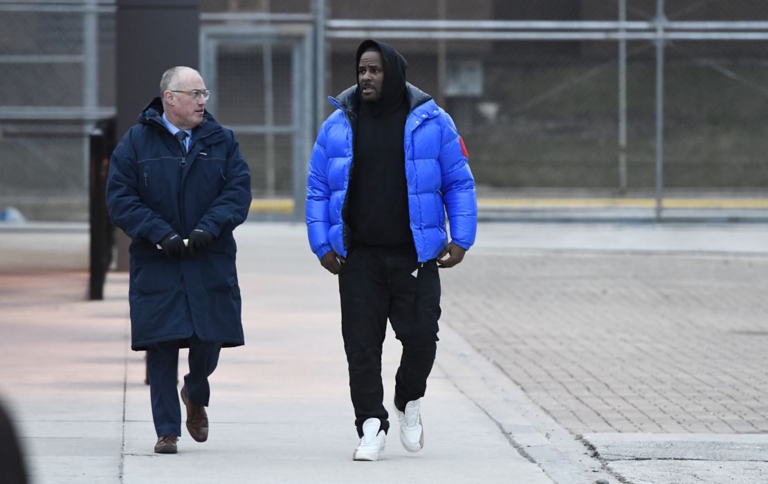 R. Kelly, right, leaves Cook County Jail with his attorney Steve Greenberg on Monday.