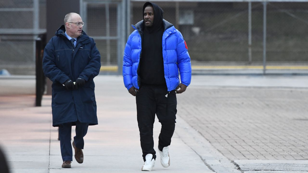 R. Kelly, right, leaves Cook County Jail with his attorney Steve Greenberg on Monday.