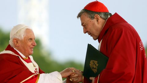 Pope Benedict XVI shakes hands with Cardinal George Pell during the Final Mass during World Youth Day Sydney 2008 in Sydney, Australia.