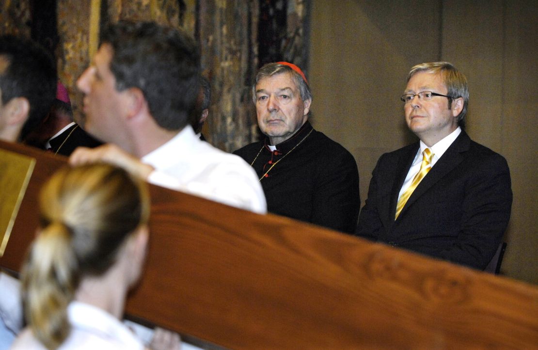 Australia's then-Prime Minister Kevin Rudd, right, and Cardinal Pell watch as the World Youth Day Cross and Icon enters the Great Hall of Parliament House in Canberra on February 18, 2008.