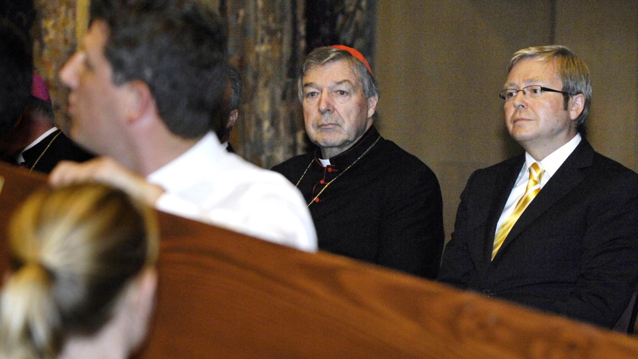 Australia's then-Prime Minister Kevin Rudd, right, and Cardinal Pell watch as the World Youth Day Cross and Icon enters the Great Hall of Parliament House in Canberra on February 18, 2008.