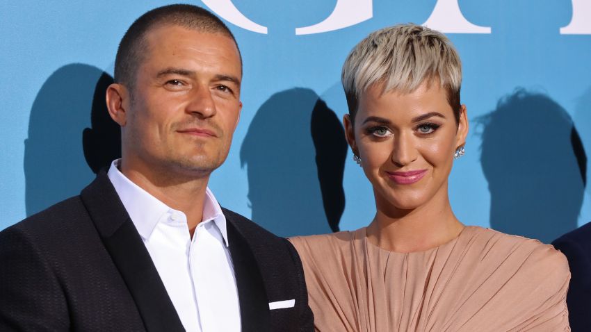British actor Orlando Bloom (L) and US singer Katy Perry pose upon their arrival at the 2nd Monte-Carlo Gala for the Global Ocean 2018 held in Monaco on September 26, 2018. - On September 26, 2018, the Prince Albert II of Monaco Foundation will hold its second Monte-Carlo Gala for the Global Ocean, a major fundraising event in the heart of Monte Carlo, in order to support its worldwide initiatives in favor of a sustainable ocean, a crucial issue calling for immediate and collective action. (Photo by Valery HACHE / AFP)        (Photo credit should read VALERY HACHE/AFP/Getty Images)