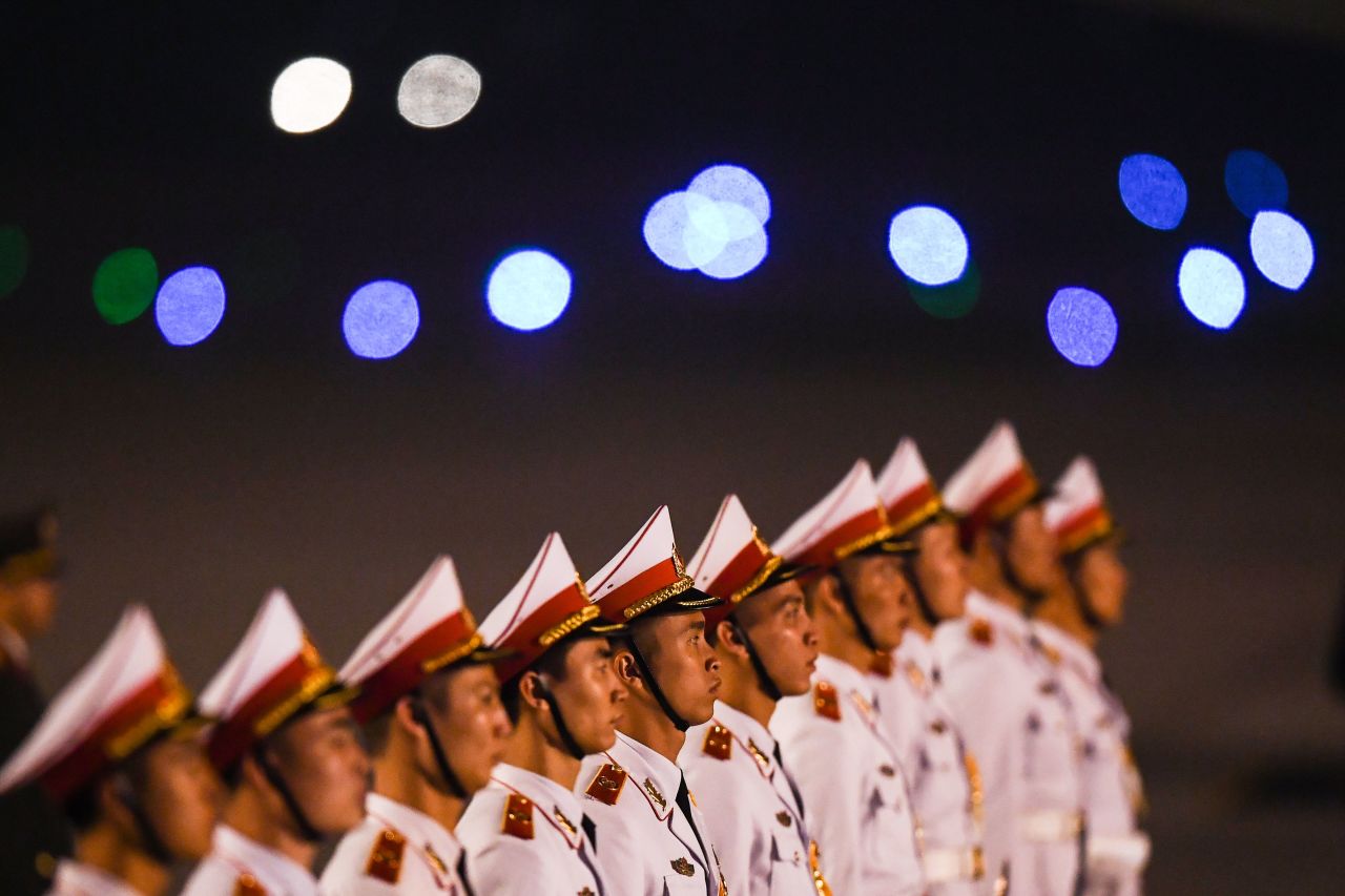 Vietnamese soldiers stand in formation as Air Force One arrives at Noi Bai International Airport on February 26.